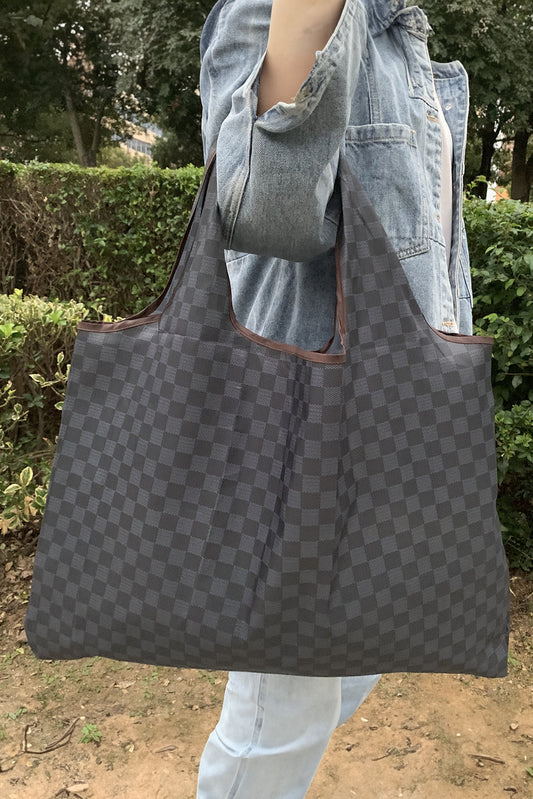 Gray checkered tote bag perfect to carry all your essentials.  Folds up for easy storage.
