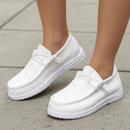 Comfortable slip on sneakers your customers will love pairing with any outfit.  Easy to pack!